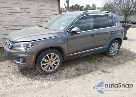 2014 Volkswagen Tiguan Sel z USA, uszkodzony, nr VIN WVGAV3AXXEW059222
